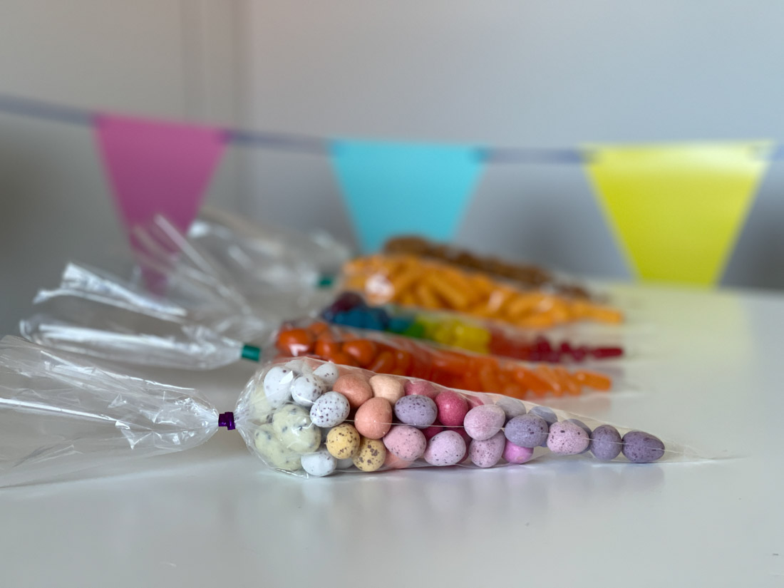 Pastel eggs inside a candy cone bag 