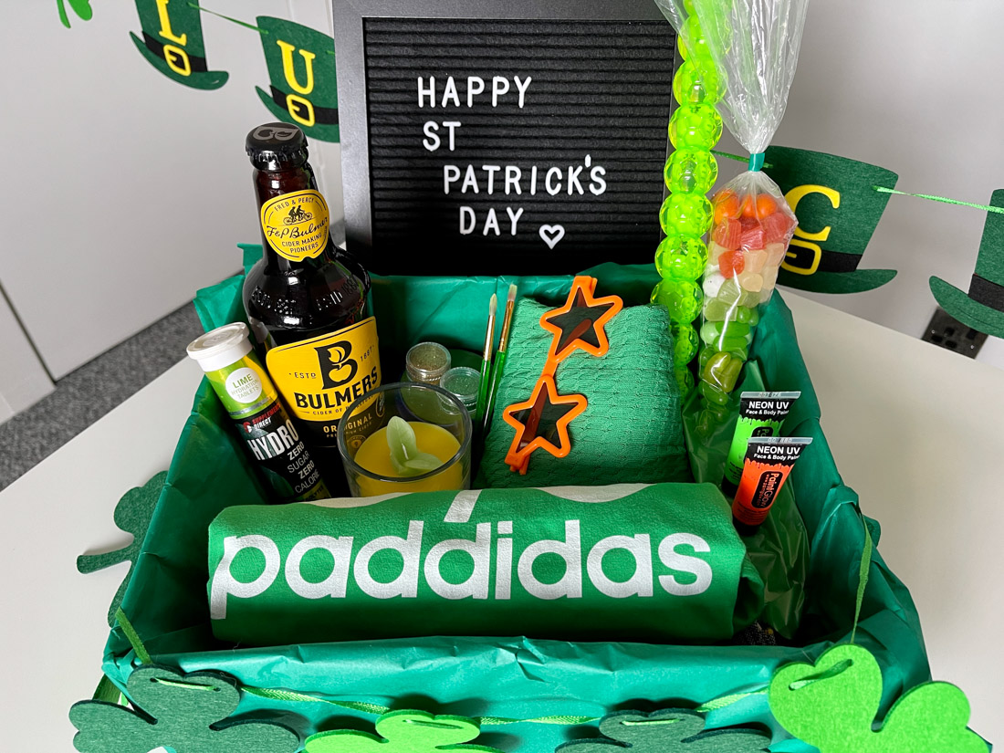 St Patrick's Day Gift Basket Hamper Box with t-shirt. glasses, cider, green top and happy St Patrick's Day sign